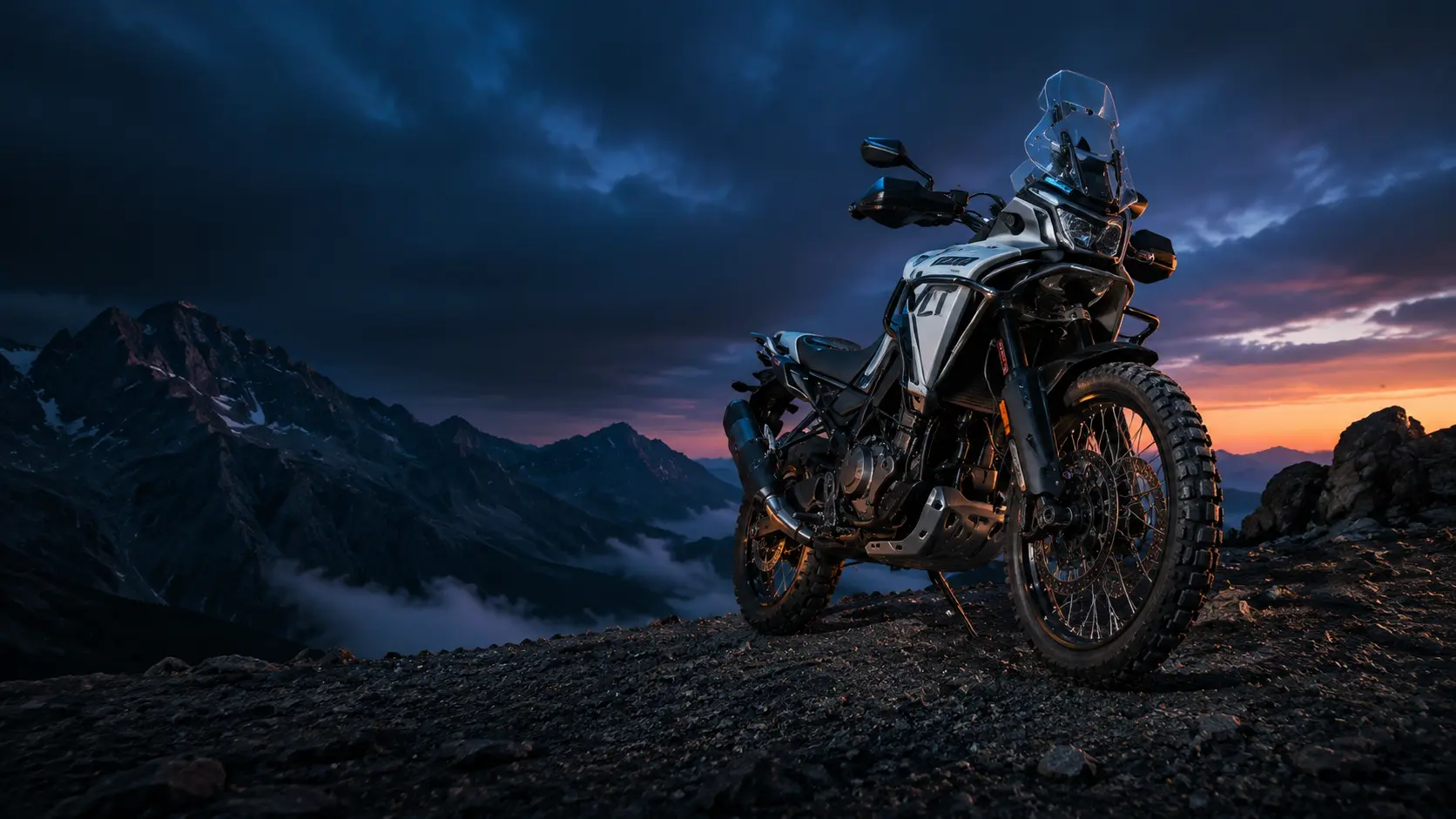 CFMOTO 450MT adventure motorcycle in mountain terrain
